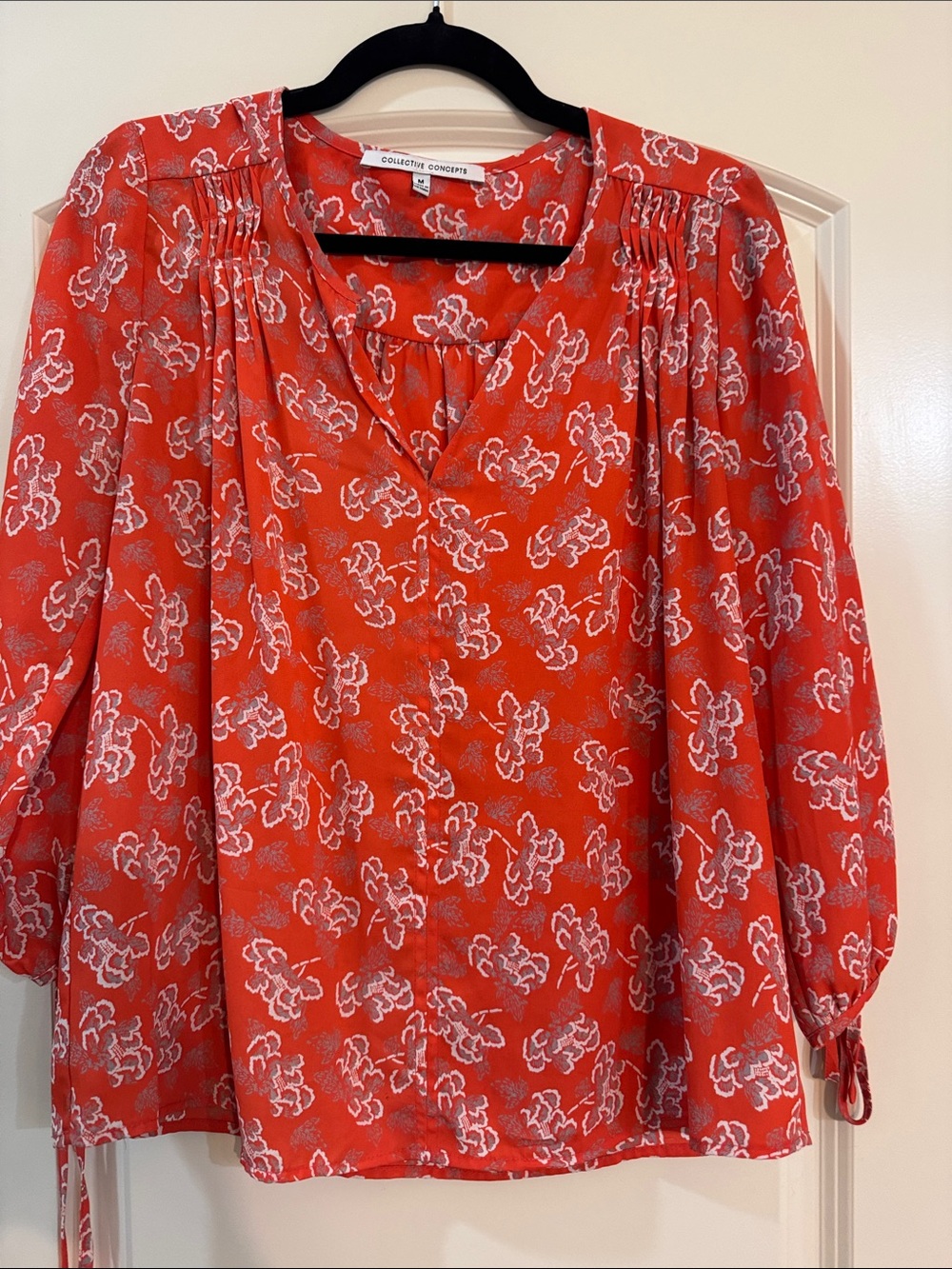 Gorgeous flowy red and floral blouse. 100% polyester